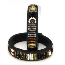 Load image into Gallery viewer, Beaded leather wrist bands Scott's of London